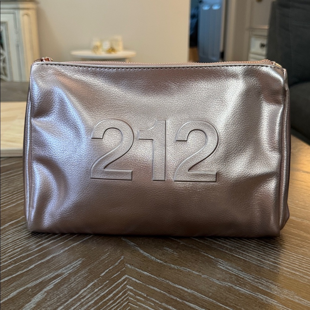 Carolina Herrera 212 rose gold cosmetic bag